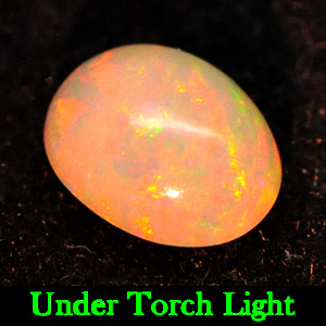 Genuine 100% Natural Play of Colour Opal .83ct 8.0x6.0x3.9mm Semi-Transparent Ethiopia