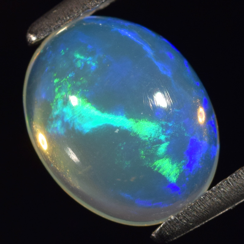 Genuine 100% Natural Crystal Welo Cabochon White Opal 1.26ct 9.0x7.0x4.2mm Semi-Translucent Ethiopia